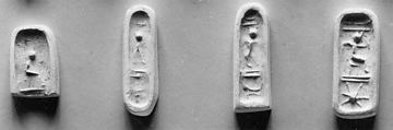 Stamp seal (in the shape of a foot, with loop handle) with deities (?) and anthropomorphic figures
, Steatite, black, Phoenician (?)
