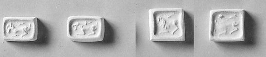 Stamp seal (cubical) with animals 
, Steatite, black, Phoenician (?)