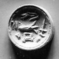 Double convex discoid (bulla) seal engraved on two faces, Red steatite, Hittite