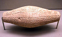 Cuneiform cylinder with inscription of Nebuchadnezzar II, describing the rebuilding of Ebabbar, the temple of the sun-god Shamash at Sippar, Clay, Babylonian