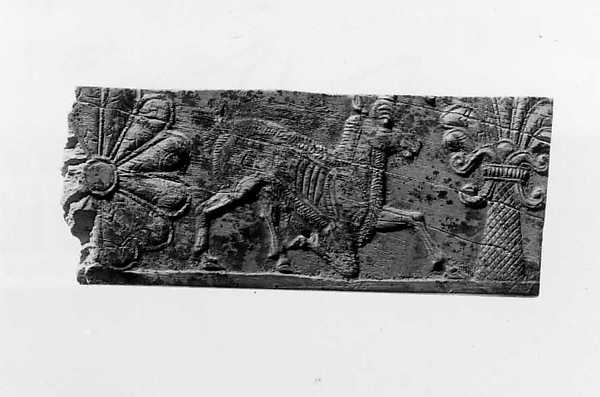 Panel fragment with a kneeling horned animal 0.75 x 2.24 in. (1.91 x 5.69 cm)
