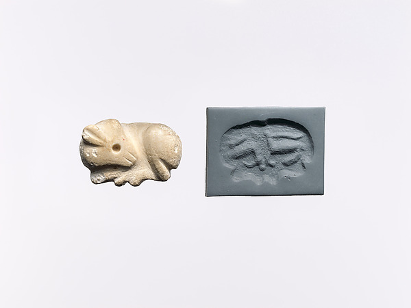 Seal amulet in the form of a reclining cow H. 5/8 x W. 1 1/16 x D. 1 11/16 in. (1.5 x 2.7 x 4.3 cm) String Hole: 3/16 in. (0.5 cm)