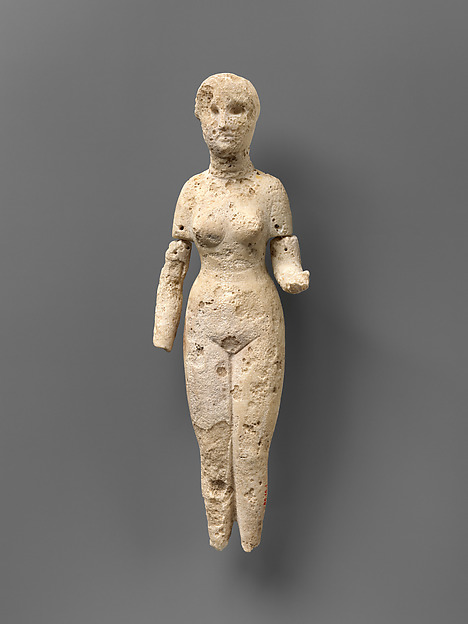Figure of a standing woman 10 5/8 in. × 4 in. × 1 7/8 in. (27 × 10.1 × 4.7 cm)