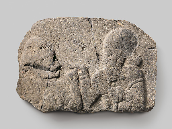Relief: man holding up a cup to a woman 17 x 25 x 3.5 in. (43.18 x 63.5 x 8.89 cm)