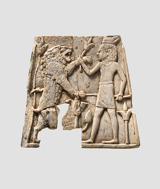 Plaque carved in relief with figure fighting a lion by an unrecorded maker, The Metropolitan Museum of Art