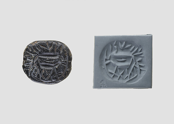 Low hemispheroid seal with later inscription