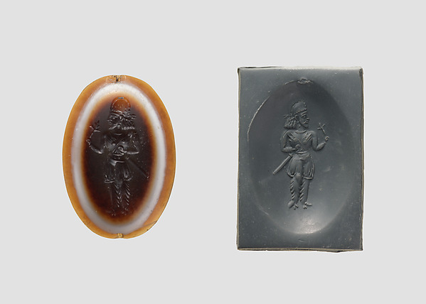 Stamp seal: standing noble holding a flower by an unrecorded maker, The Metropolitan Museum of Art