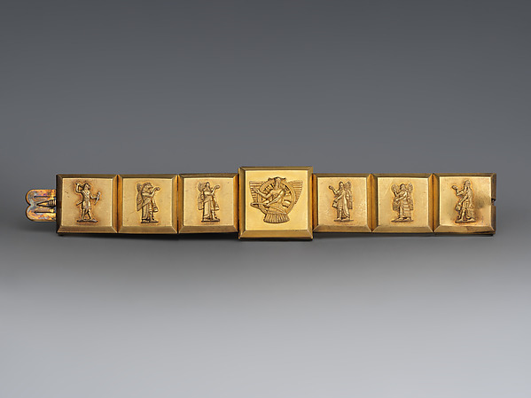 Hinged bracelet with Assyrian-inspired decoration