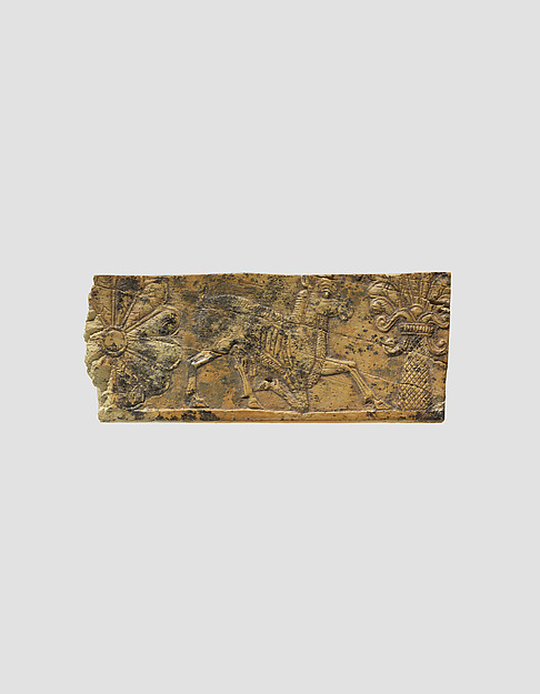 Panel fragment with a kneeling horned animal
