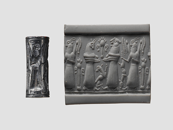 Cylinder seal and modern impression: animal-headed divinities with prey by an unrecorded maker, The Metropolitan Museum of Art