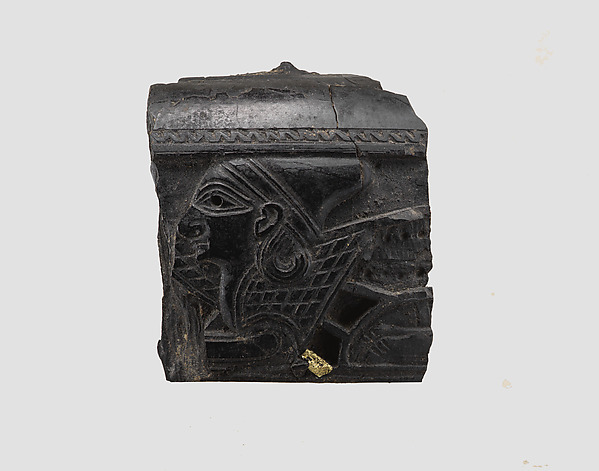 Cosmetic box fragment carved in relief with the head of a sphinx by an unrecorded maker, The Metropolitan Museum of Art