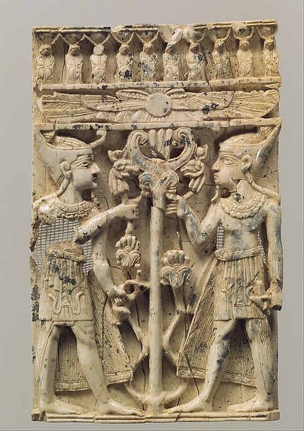 <bdi class="metadata-value">Furniture plaque carved in high relief with two Egyptianizing figures flanking a volute tree H. 4 7/8 x W. 3 1/16 x Th. 7/16 in. (12.4 x 7.7 x 1.1 cm)</bdi>