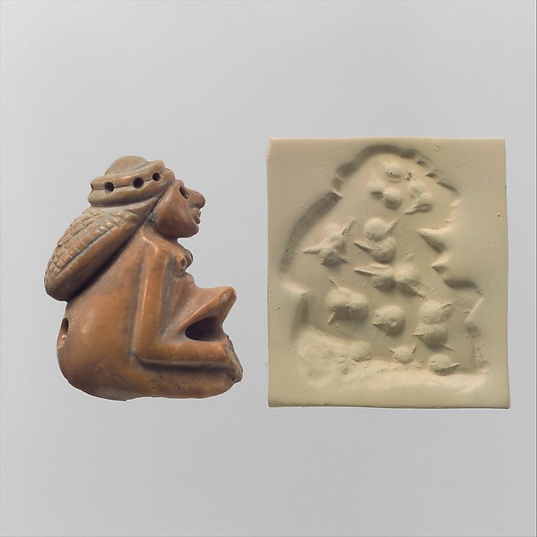 Seal amulet in the form of a seated female and modern impression 5/8 x 7/8 x 1 1/8 in. (1.5 x 2.3 x 3 cm)