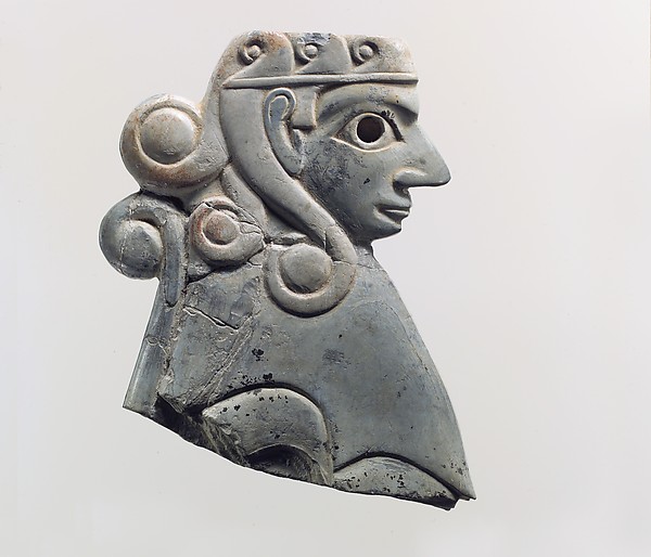 Furniture plaque: female sphinx with Hathor-style curls 2.87 x 2.24 in. (7.29 x 5.69 cm)
