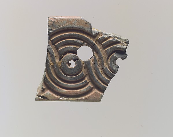 Plaque fragment 1 x 1.12 in. (2.54 x 2.84 cm)