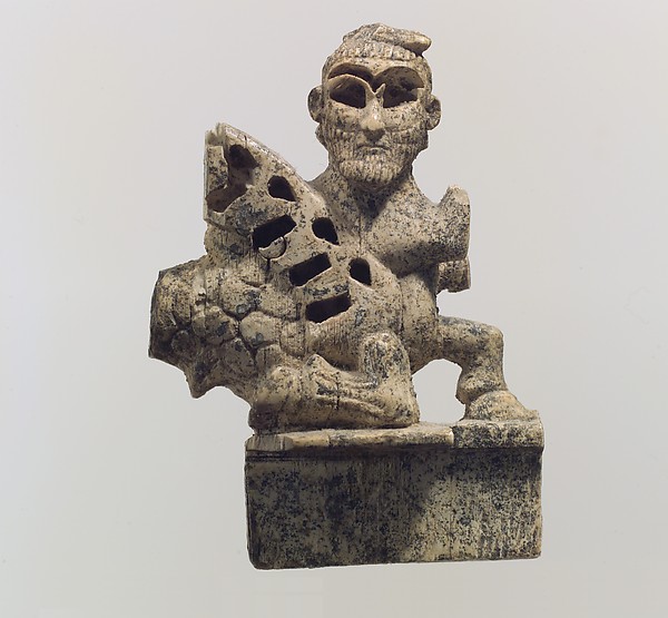 Figure of a supernatural creature 1.38 x 2.13 in. (3.51 x 5.41 cm)