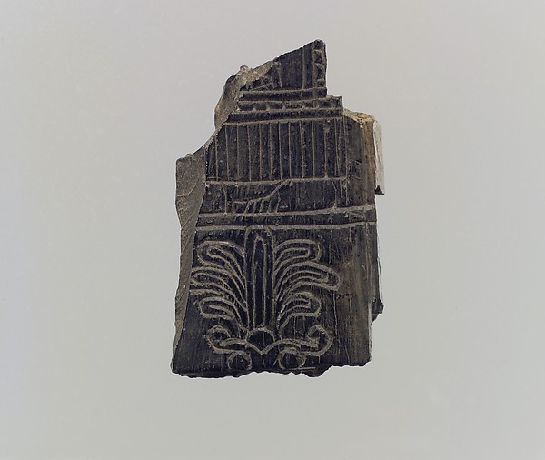 Plaque fragment 1.14 x 0.71 in. (2.9 x 1.8 cm)