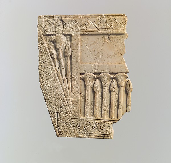 Furniture plaque carved in relief with papyrus buds and flowers 4.06 x 3.06 in. (10.31 x 7.77 cm)