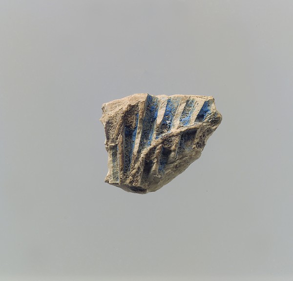 Plaque fragment 0.75 x 0.16 in. (1.91 x 0.41 cm)