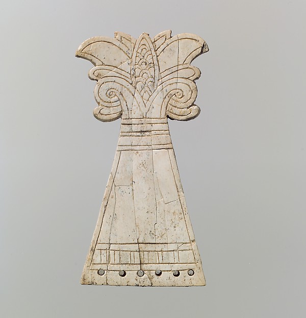 Incised horse frontlet carved into the shape of a flowering, volute palmette tree 4.21 x 2.2 x 2.09 in. (10.69 x 5.59 x 5.31 cm)