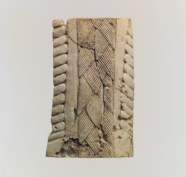 Ivory fragment 3.27 x 2.09 x 0.63 in. (8.31 x 5.31 x 1.6 cm)