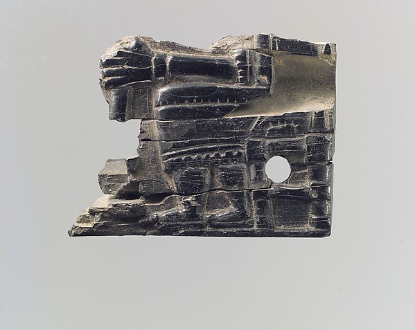 Plaque fragment 1.18 x 1.57 x 0.31 in. (3 x 3.99 x 0.79 cm)