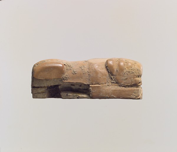 Figure of crouching lion H. 1.9 cm x W. .7 cm x D. 2.6 cm