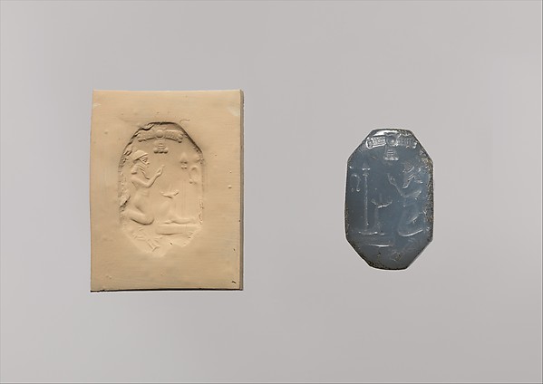 Stamp seal: worshiper kneeling before mushhushshu-dragon and standard Seal Face: 2.41 x 1.55 cm Height: 3.12 cm String Hole: 0.2 cm