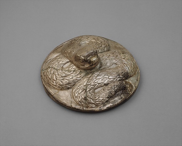 Lid (?) with a serpent Diam. 5 in. (12.8 cm)