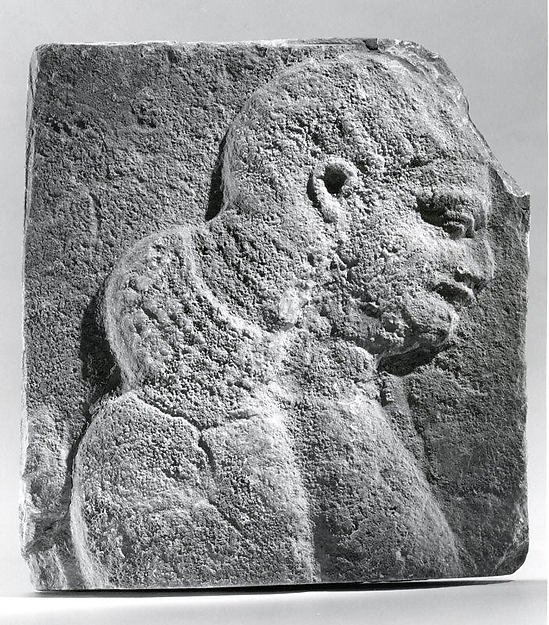 Relief: head and shoulders of a beardless man, possibly a eunuch 10 1/8 × 9 1/4 in. (25.7 × 23.5 cm)
