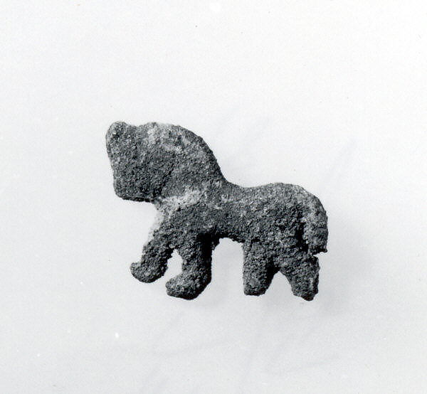 Plaque in the form of a striding lion 1.02 x 0.83 in. (2.59 x 2.11 cm)