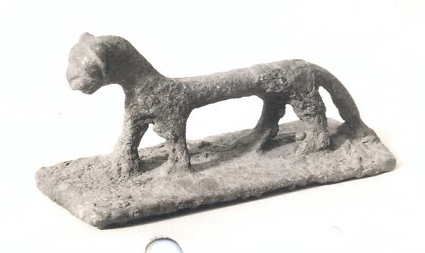 Figurine of a dog (?) 1.75 x 1.35 x 3.6 in. (4.45 x 3.43 x 9.14 cm)