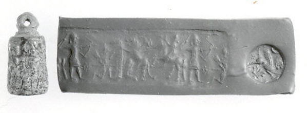 Stamp-cylinder seal: hunters and a lion Diameter: 1.77 cm Height: 3.45 cm
