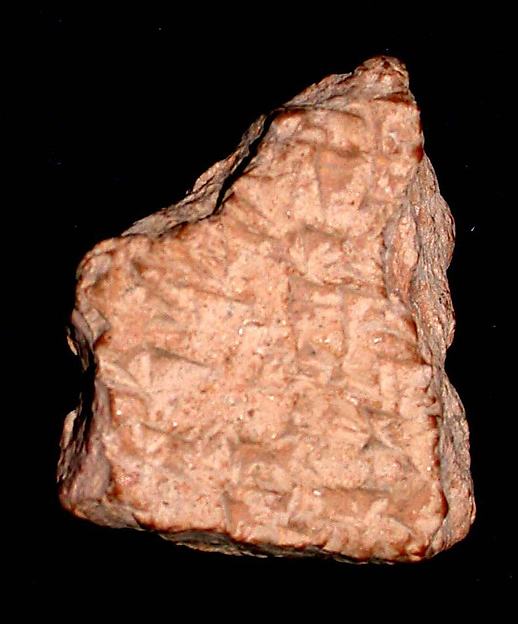 Cuneiform tablet: bilingual unidentified fragment 1 3/8 x 1 1/8 x 1/2 in. (3.6 x 3 x 1.2 cm)