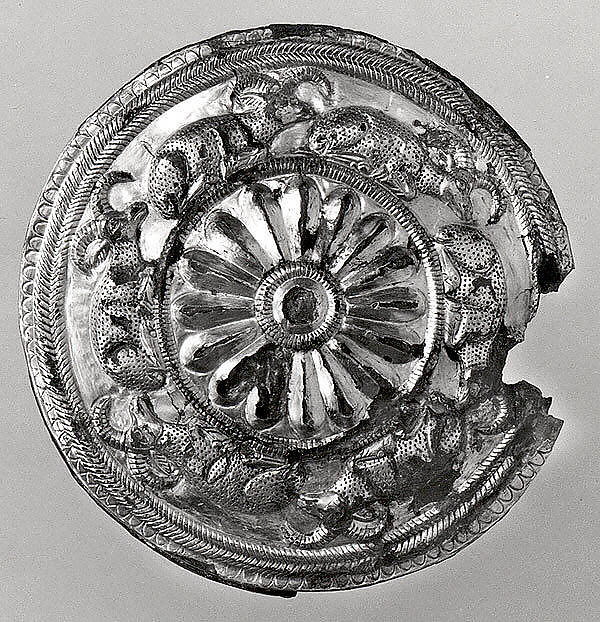 <bdi class="metadata-value">Roundel with a rosette and recumbent horned animals 0.55 in. (1.4 cm)</bdi>