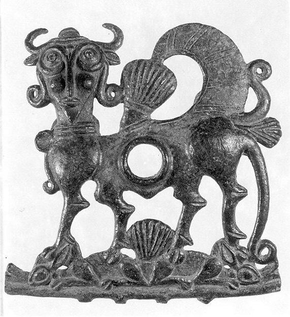 Horse bit cheekpiece in form of a winged, human-headed quadruped 5.51 x 5.24 in. (14 x 13.31 cm)