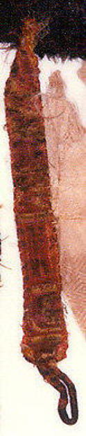 Textile fragment .75 x 8.25 in. (1.9 x 21 cm)