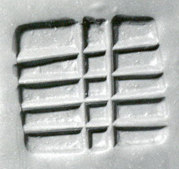 Loop-handled rectangular stamping device Seal Face: 2.81 x 1.4 cm Height: 1.31 cm String Hole: 0.3 cm