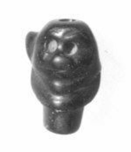Bead in the shape of Pazuzu head 0.67 in. (1.7 cm)