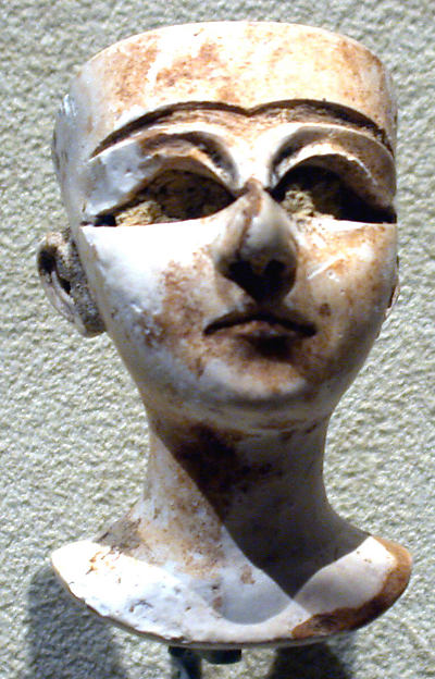 Head of a female 1.8 x 1.07 in. (4.57 x 2.72 cm)