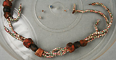 Necklace, Glass, uncertain possibly glass material, carnelian?, string, African, made in Europe