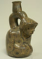 Stirrup Spout Bottle; Kneeling Figure, Ceramic, pigment, Cupisnique