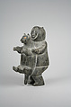 Stone Male in Parka Holding Animal, Tunu, Stone, pigment, Inuit