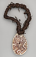 Engraved pearl shell and hair-string belt (riji, or jakoli, longkalongka), Pearl shell, human hair, ocher, Western Kimberley