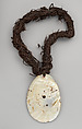 Riji, jakoli, or longkalongka (engraved pearl shell) with belt, Aboriginal artist, Pearl shell, human hair, ocher, Western Kimberley