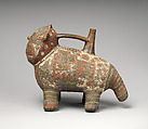 Feline-shaped spout-and-bridge bottle, Paracas artist(s), Ceramic, post-fire paint, Paracas