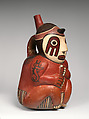 Bottle with seated figure, Nasca artist(s), Ceramic, slip, Nasca