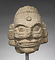 Head of a Rain God, Fossiliferous limestone, Maya