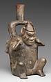 Stirrup Spout Bottle: Figure Carrying Deer, Ceramic, Cupisnique