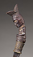 Piso sanalenggam (sword), Toba Batak artist, Water buffalo horn, copper/zinc alloy (sun inlay and end of the handle), lead (necklace and eyes of the handle figure), iron alloy, Toba Batak